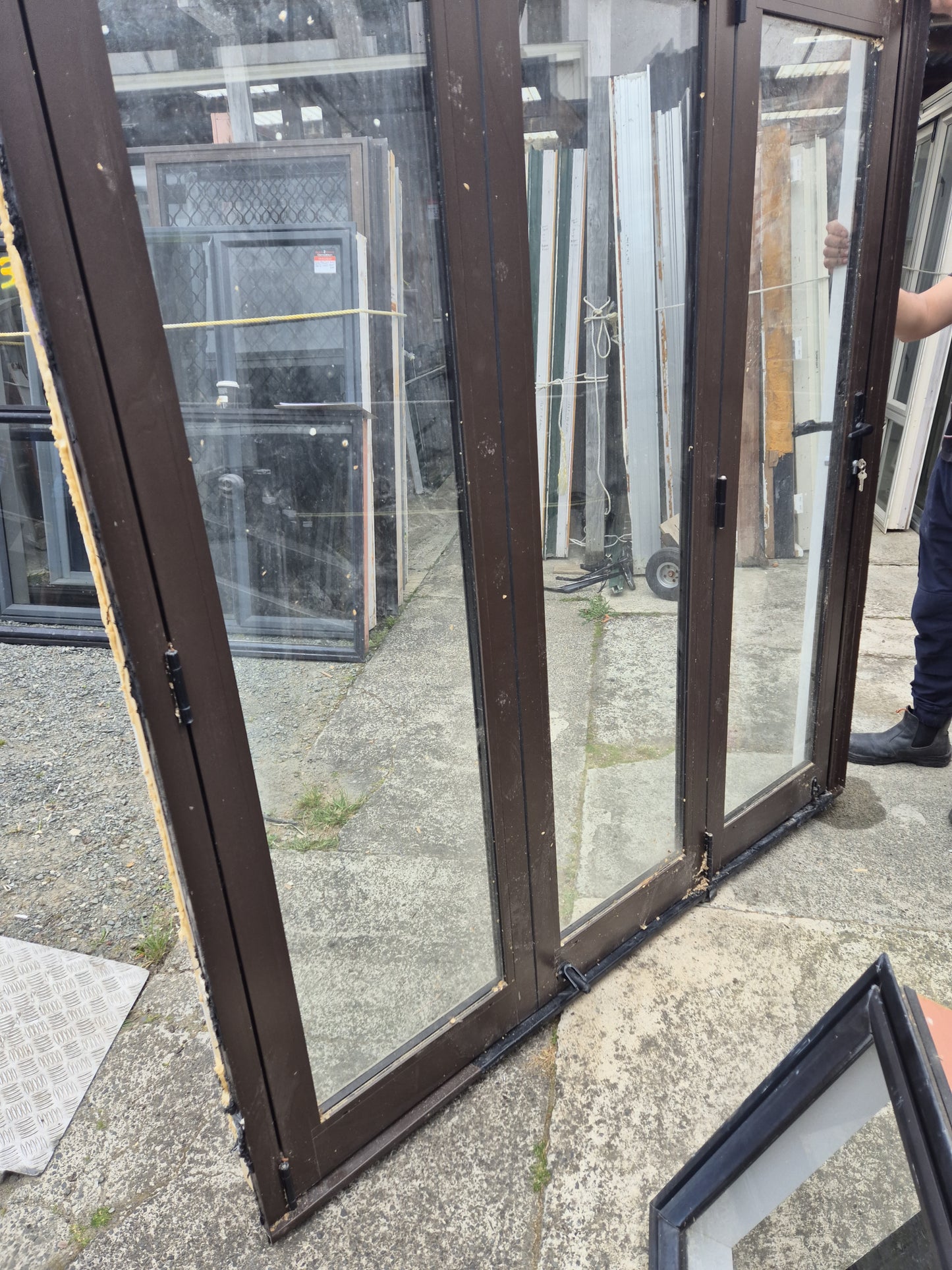 Double Glazed Brown Bifold Door with Outside Access Door 1980 H x 1800 W #2190