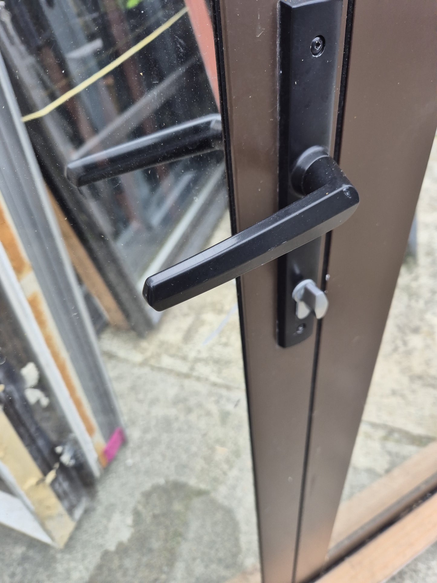 Double Glazed Brown Bifold Door with Outside Access Door 1980 H x 1800 W #2190