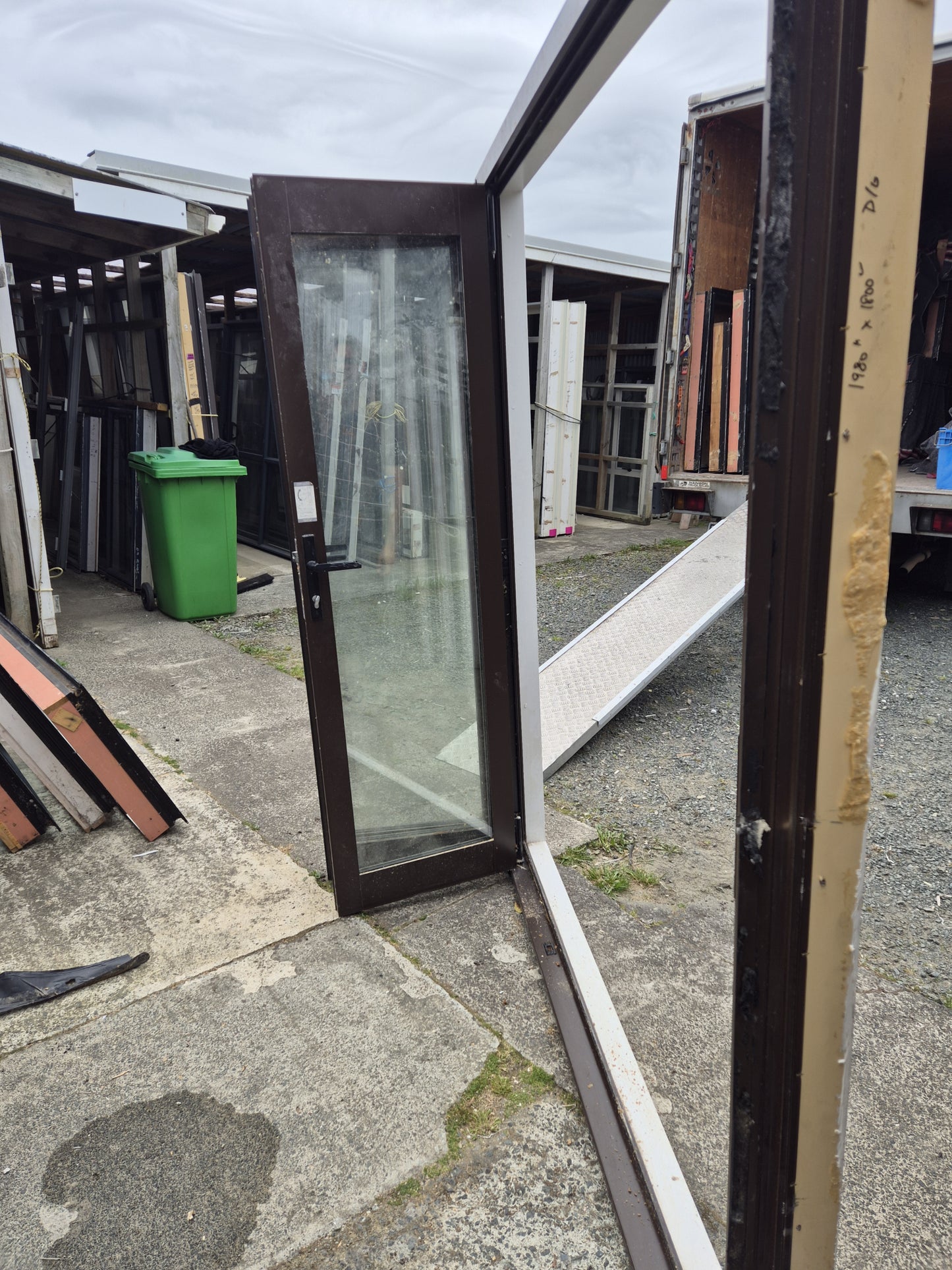 Double Glazed Brown Bifold Door with Outside Access Door 1980 H x 1800 W #2190
