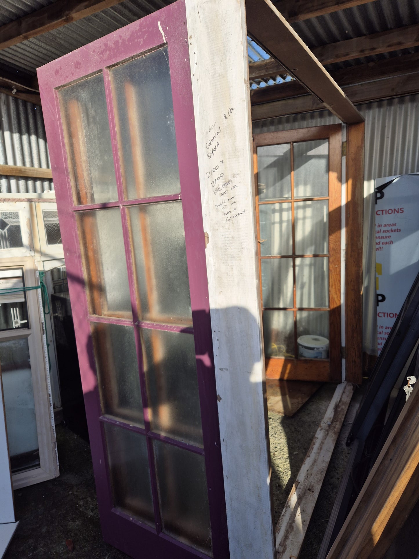 Colonial (8 lites), Cedar Bifolding Doors 2100 x 2100
