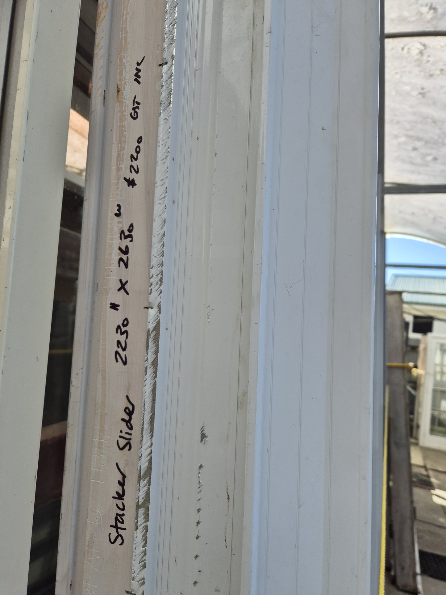 White Stacker Slider with opening window 2230 H x 2630 W #2009