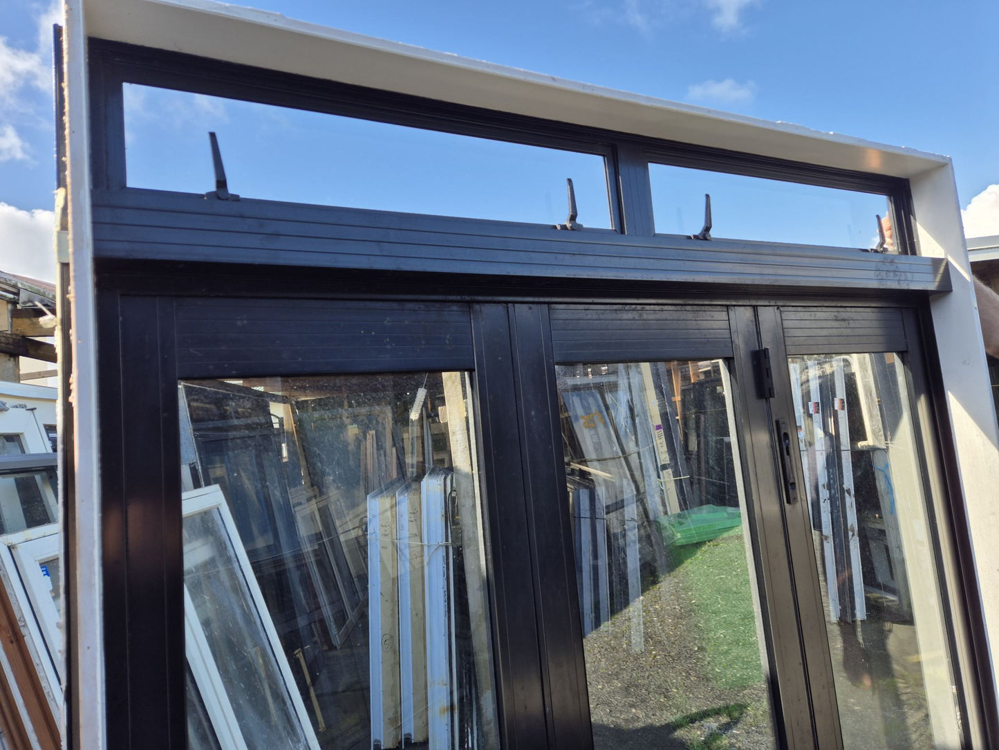 Black Bifolding doors 2/2.3 H x 1.8W #2063 see matching joinery