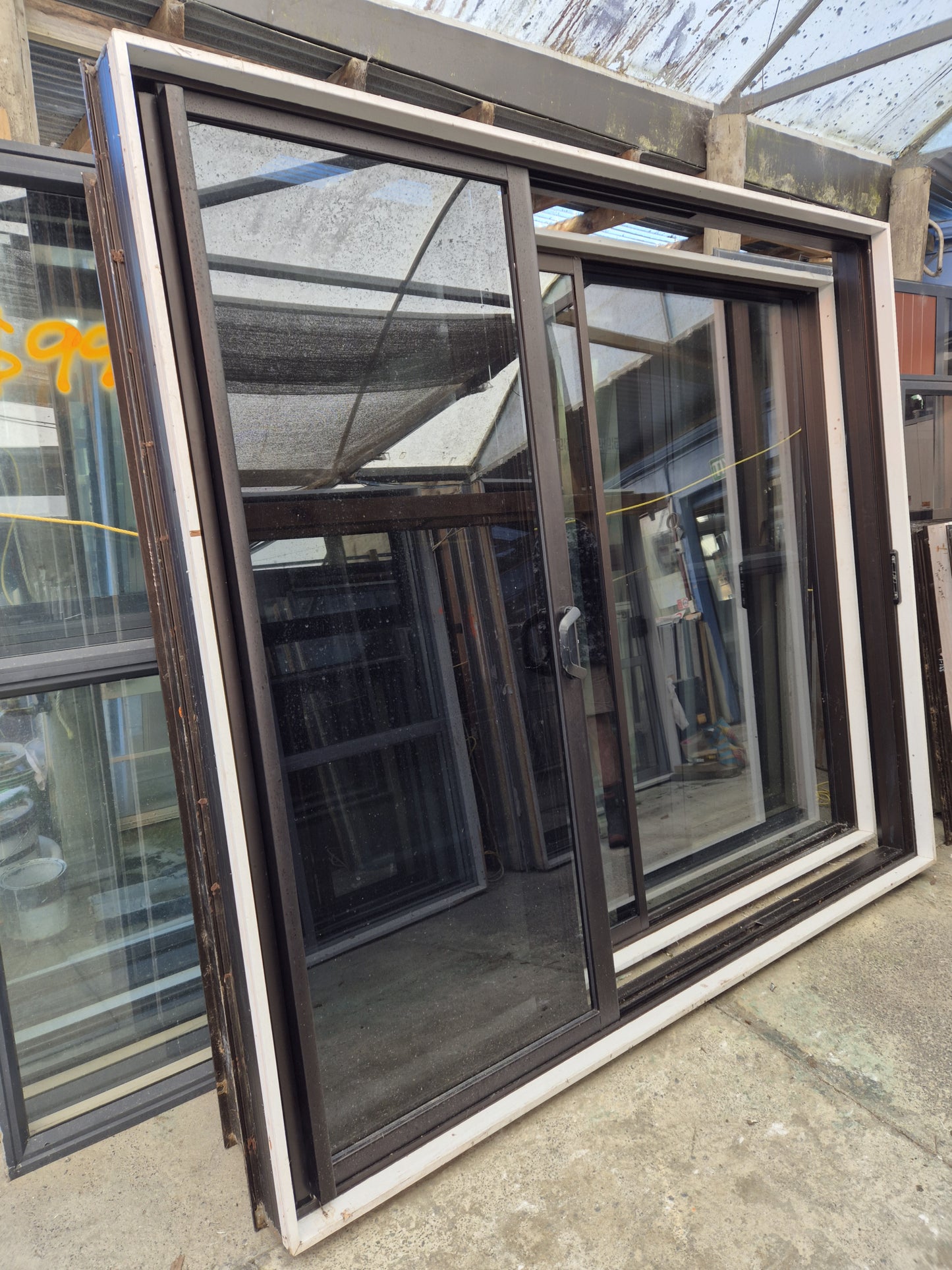 Modern Bronze Stacker Slider with windows 2135 H x 2400 W #2060
