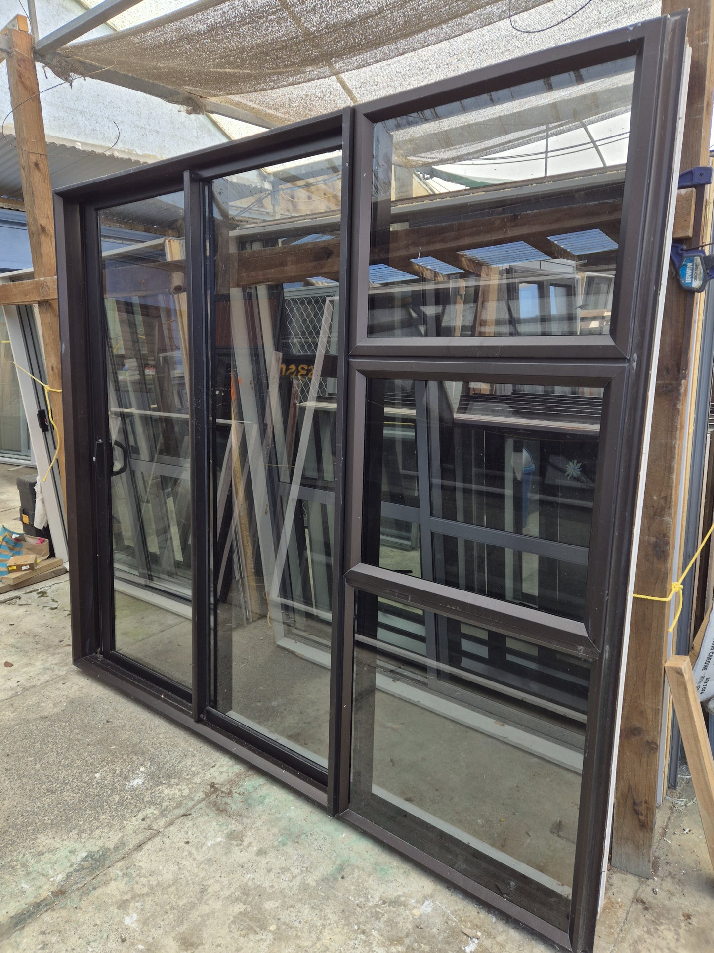 Modern Bronze Stacker Slider with windows 2135 H x 2400 W #2060