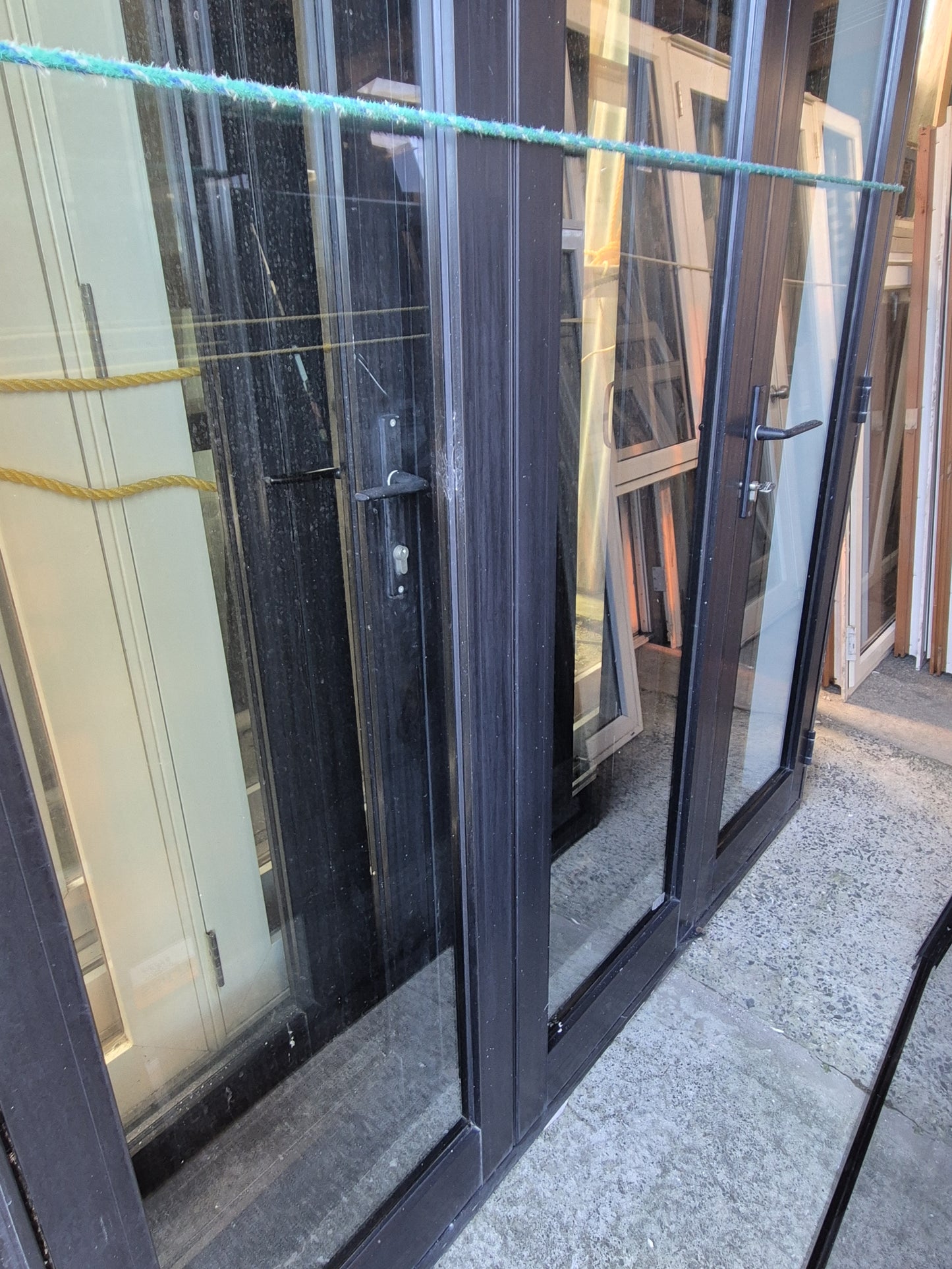 Black Bifolding doors 2/2.3 H x 1.8W #2063 see matching joinery