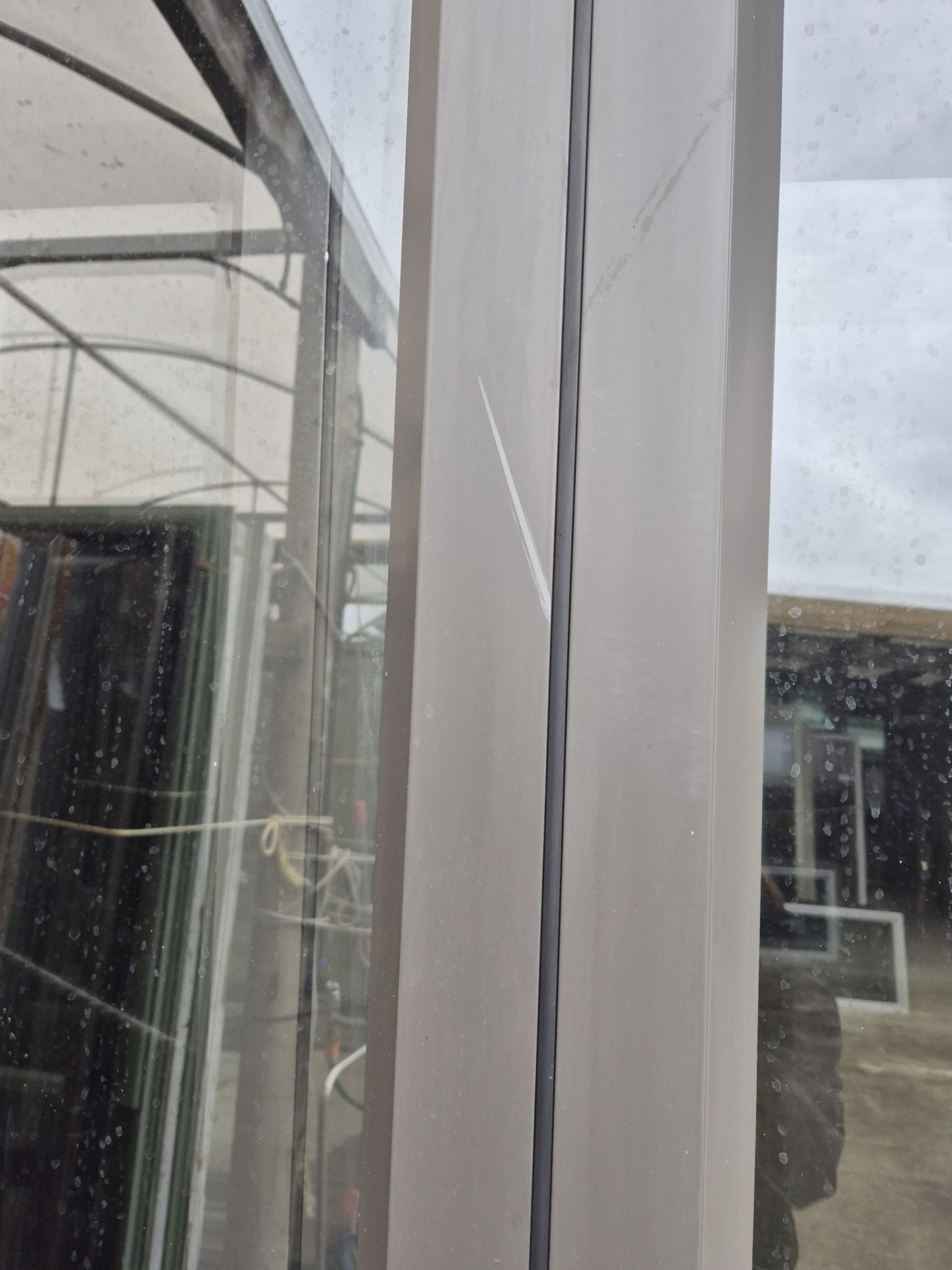 Ironsand Bifolding Door with Access Door 2140 H x 2000 W #2099