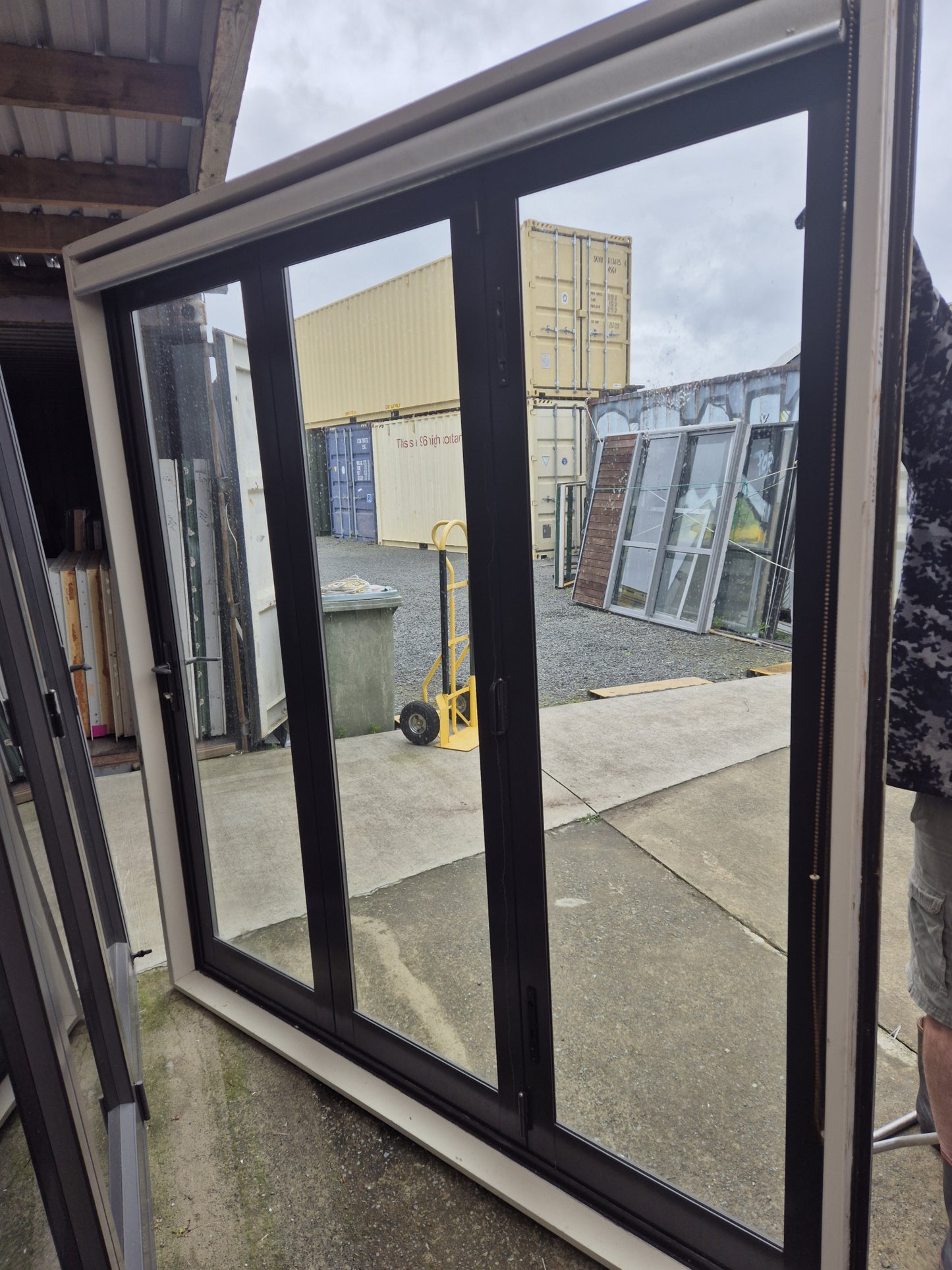 Ironsand Bifolding Door with Access Door 2140 H x 2000 W #2099