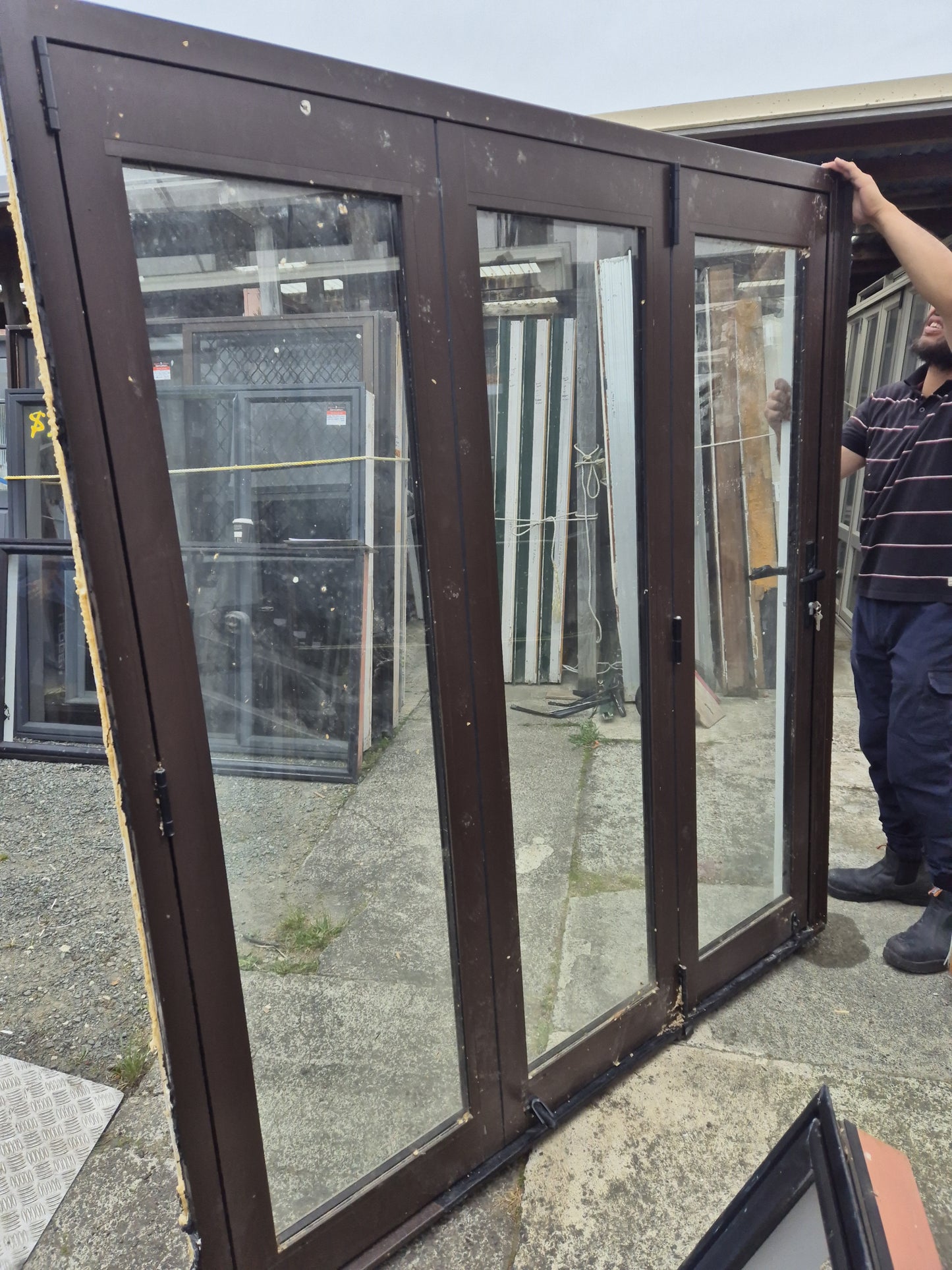 Double Glazed Brown Bifold Door with Outside Access Door 1980 H x 1800 W #2190