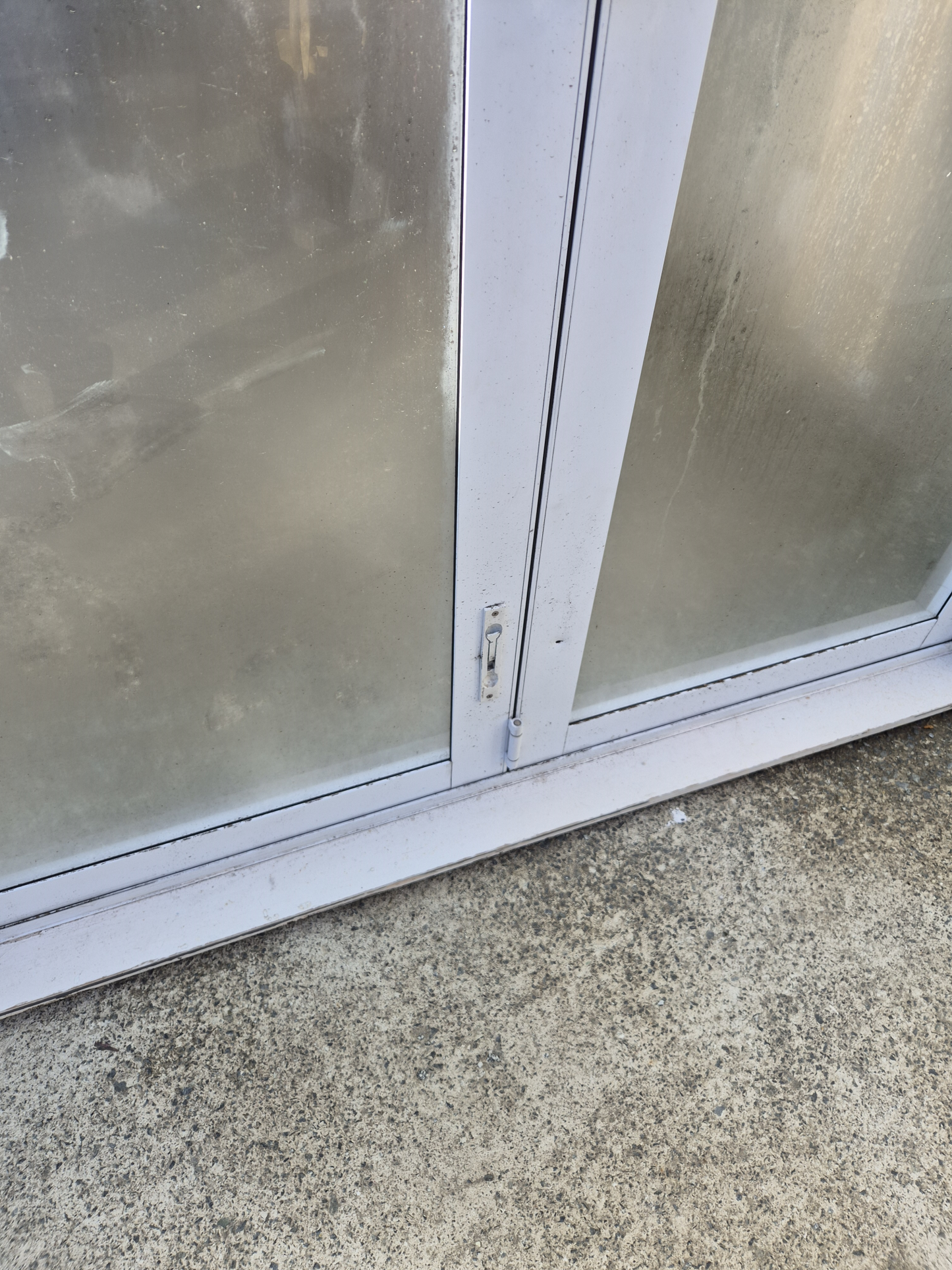 White Bifold door with external access door 2045 x 2460W #2075
