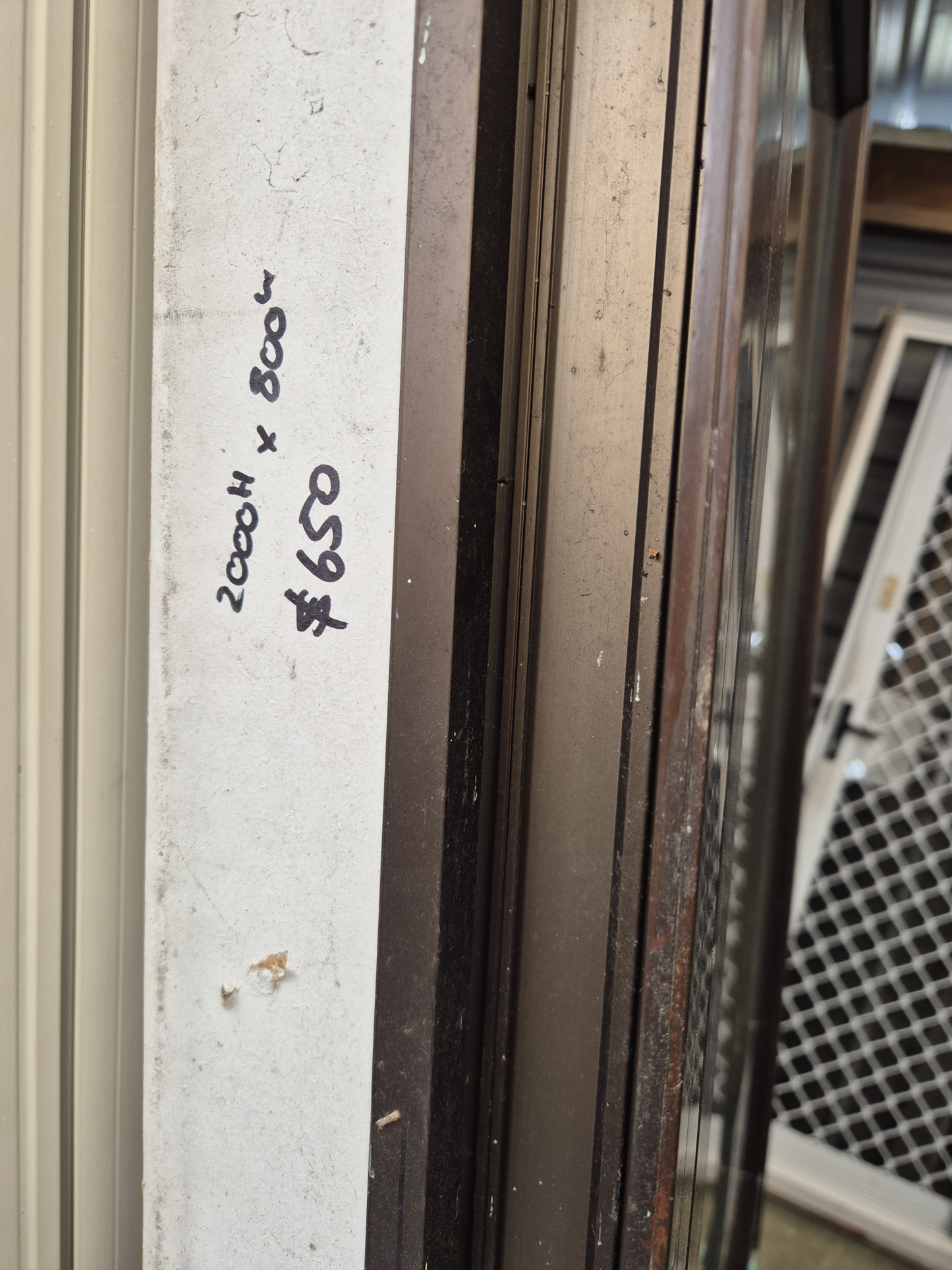 Bronze Door 2 H x 800 W opens outward #2505