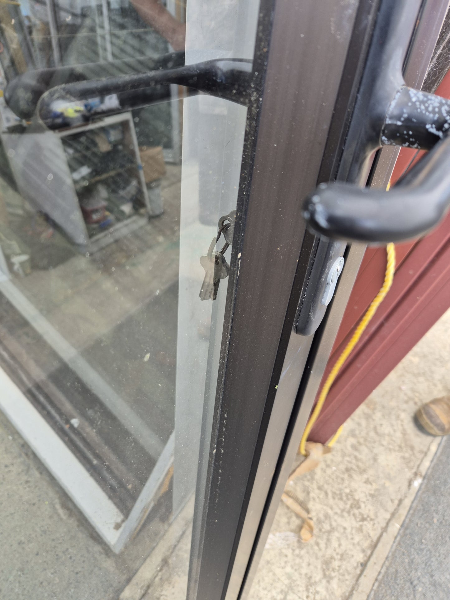 Bronze Bifolding Door with Access Door 2 m H x 2.4 m W #2235 - Folds flush