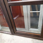 Bronze door with opening window sidelight 2m H x 1320 W