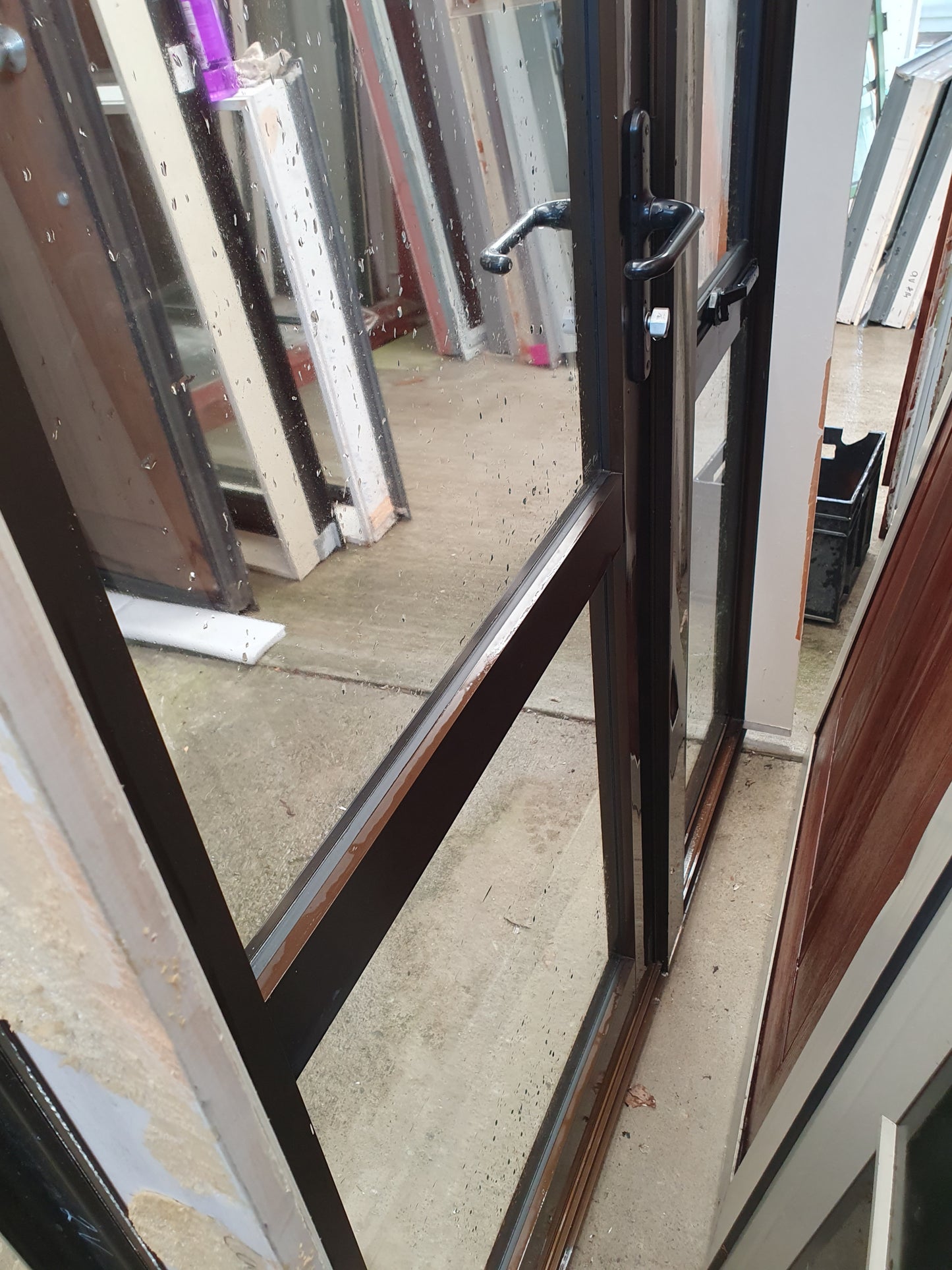 Bronze door with opening window sidelight 2m H x 1320 W