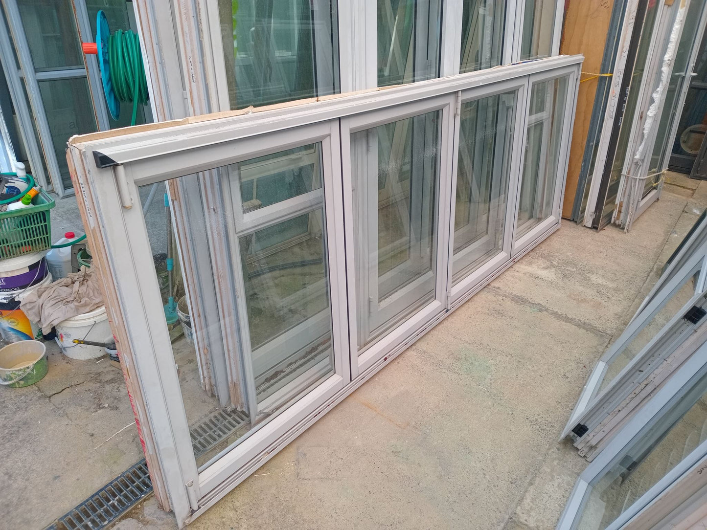 Bifolding windows, awning windows & matching doors will sell individually