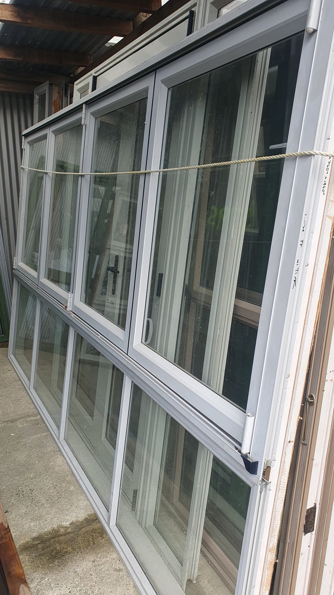 Bifolding windows, awning windows & matching doors will sell individually