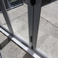 Anodised Silver Bifolding door with outside access door 2015 H x 2090 W