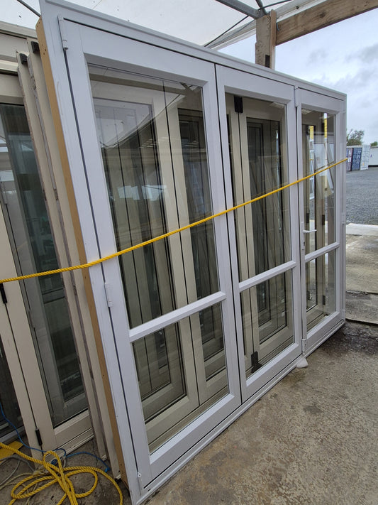 White Bifdolding Doors, with outside access 2070 H x 2400 W  #1955