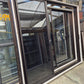 Modern Bronze Stacker Slider with windows 2135 H x 2400 W #2060