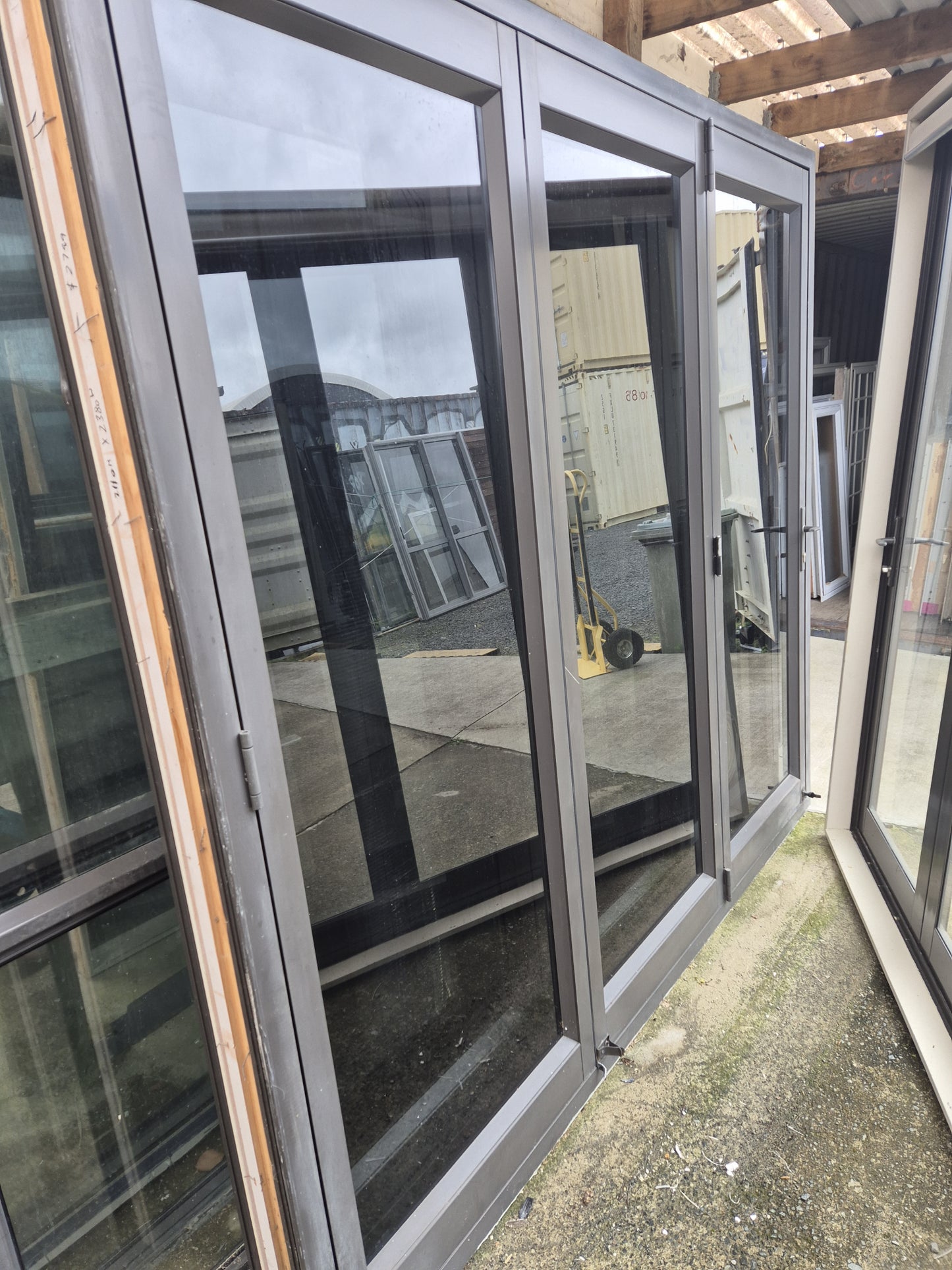 Ironsand Bifolding Door with Access Door 2110 H x 2380 W #2098