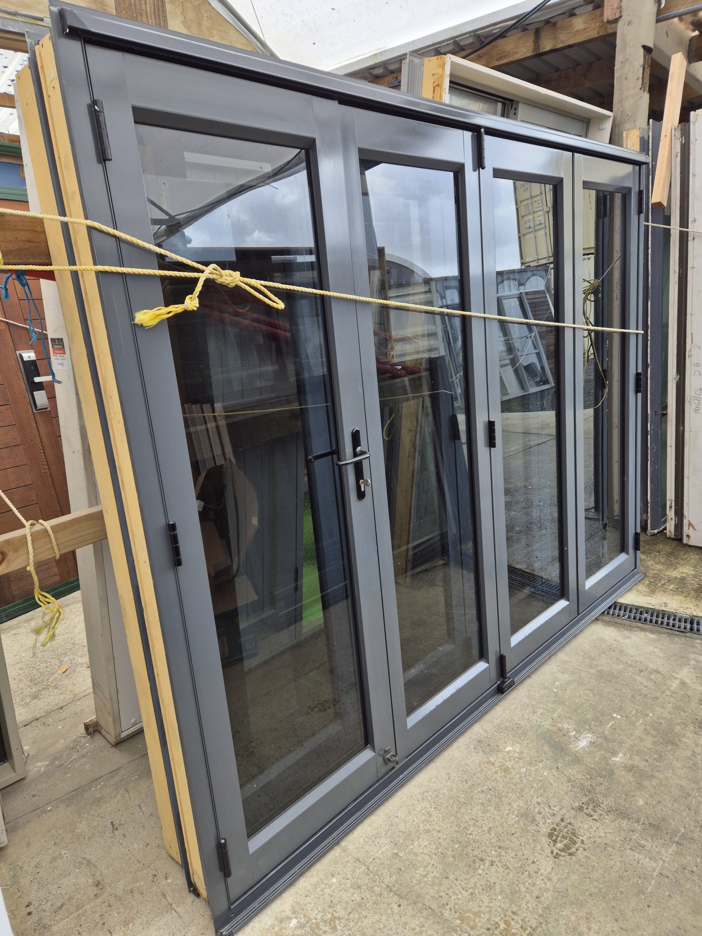 Bifolding doors 2 H x 2.6W with outside access #2152 (2 available, opposites)