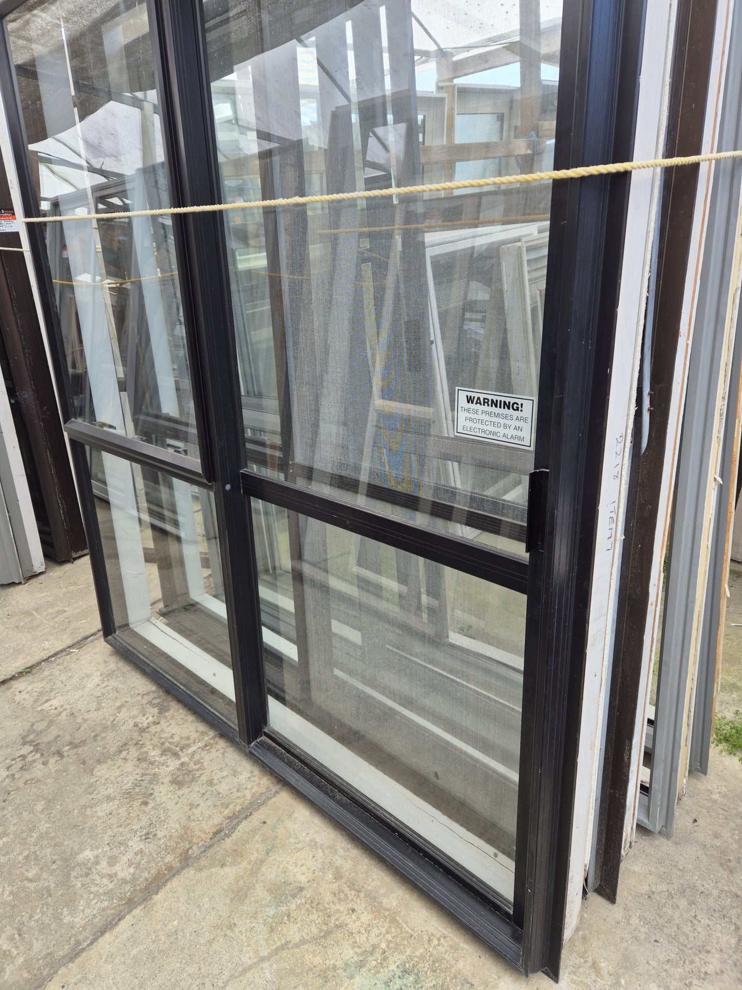 Black Sliding Door with opening window 2 H x 1.8 W #2176