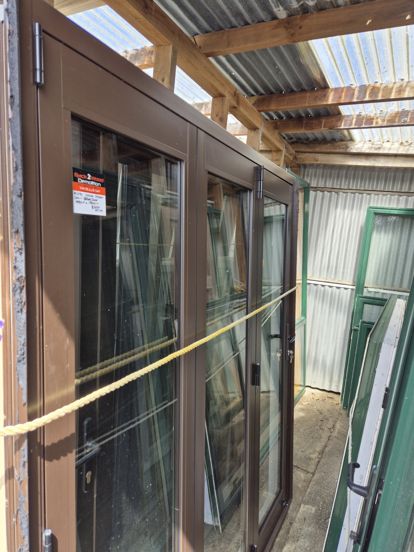 Double Glazed Brown Bifold Door with Outside Access Door 1980 H x 1800 W #2190