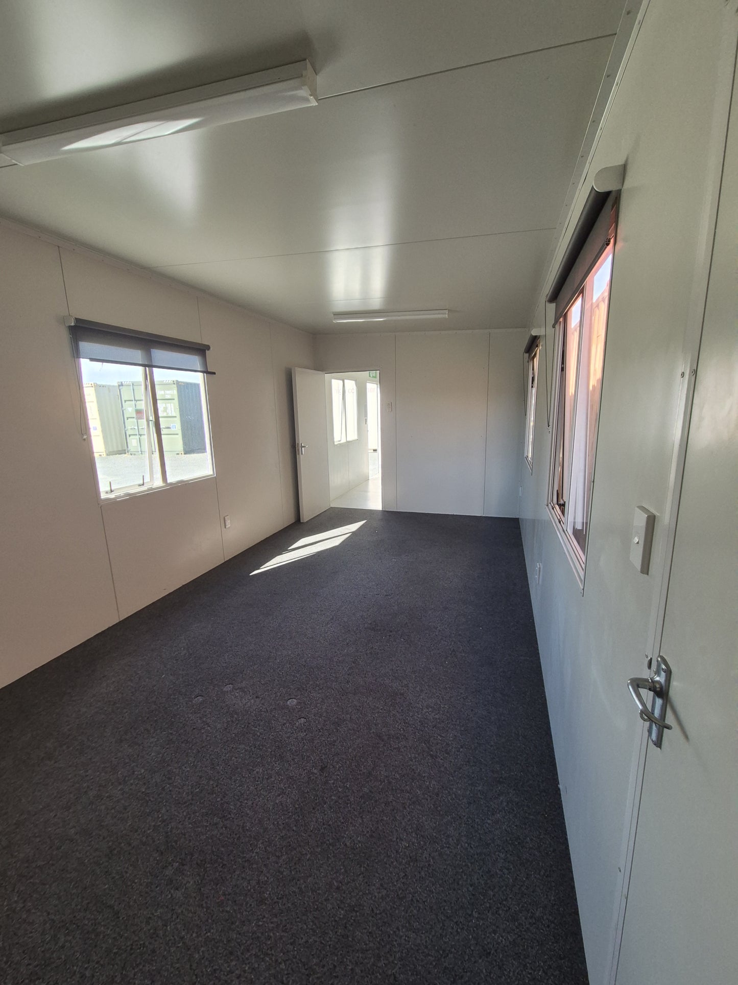 9.6 x 3m PORTACOM In near new condition, 2 rooms, 3 external doors, Air con