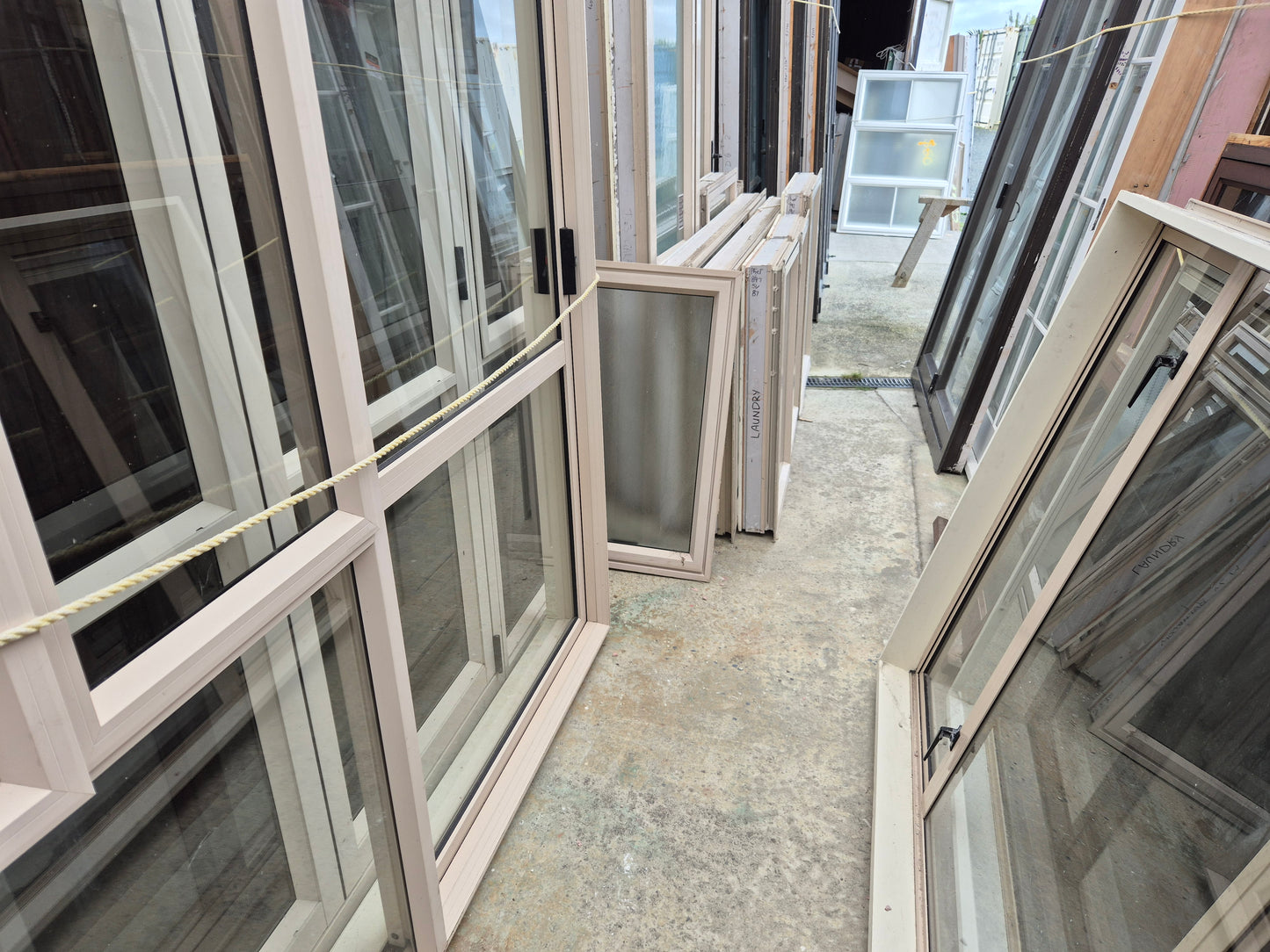 Beige Ranchslider 2 opening windows 2H x 2W #2045 matching windows