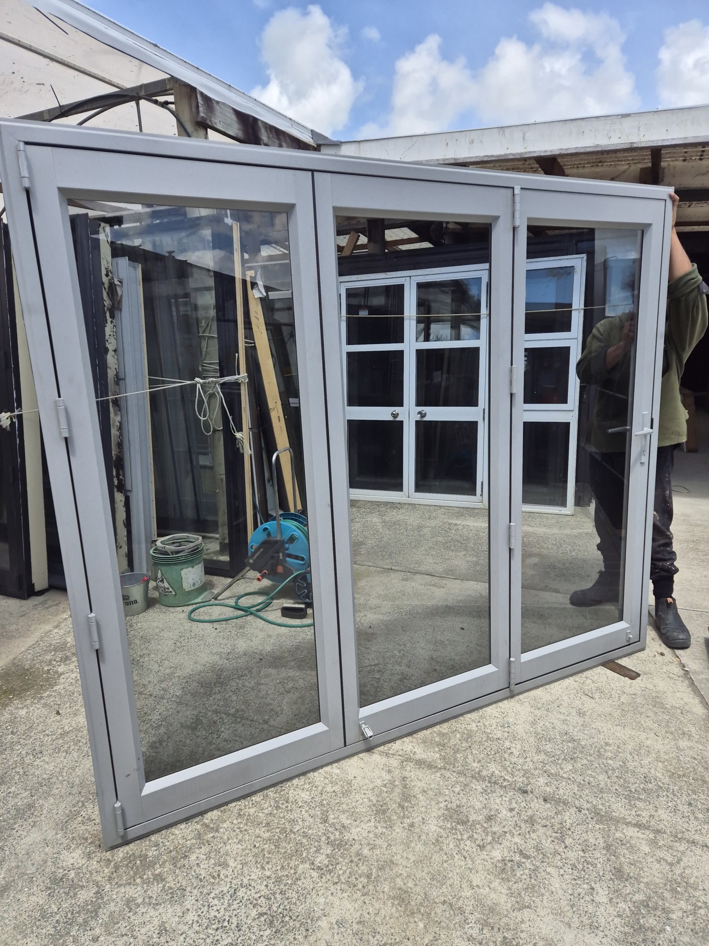 Bifolding door with outside access door 2m H x 2.4W #2077 (2 available)
