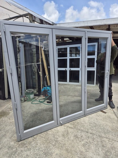 Bifolding door with outside access door 2m H x 2.4W #2077 (2 available)