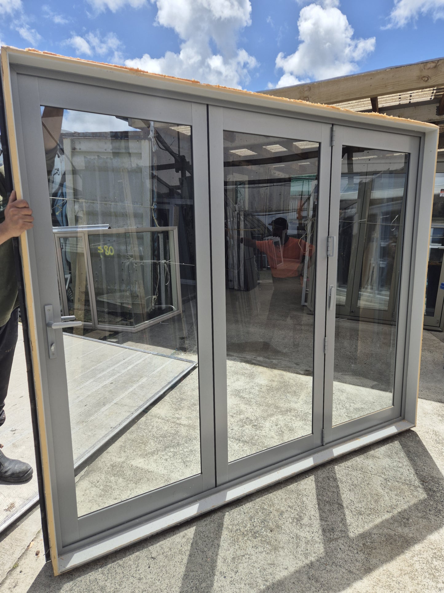 Bifolding door with outside access door 2m H x 2.4W #2077 (2 available)
