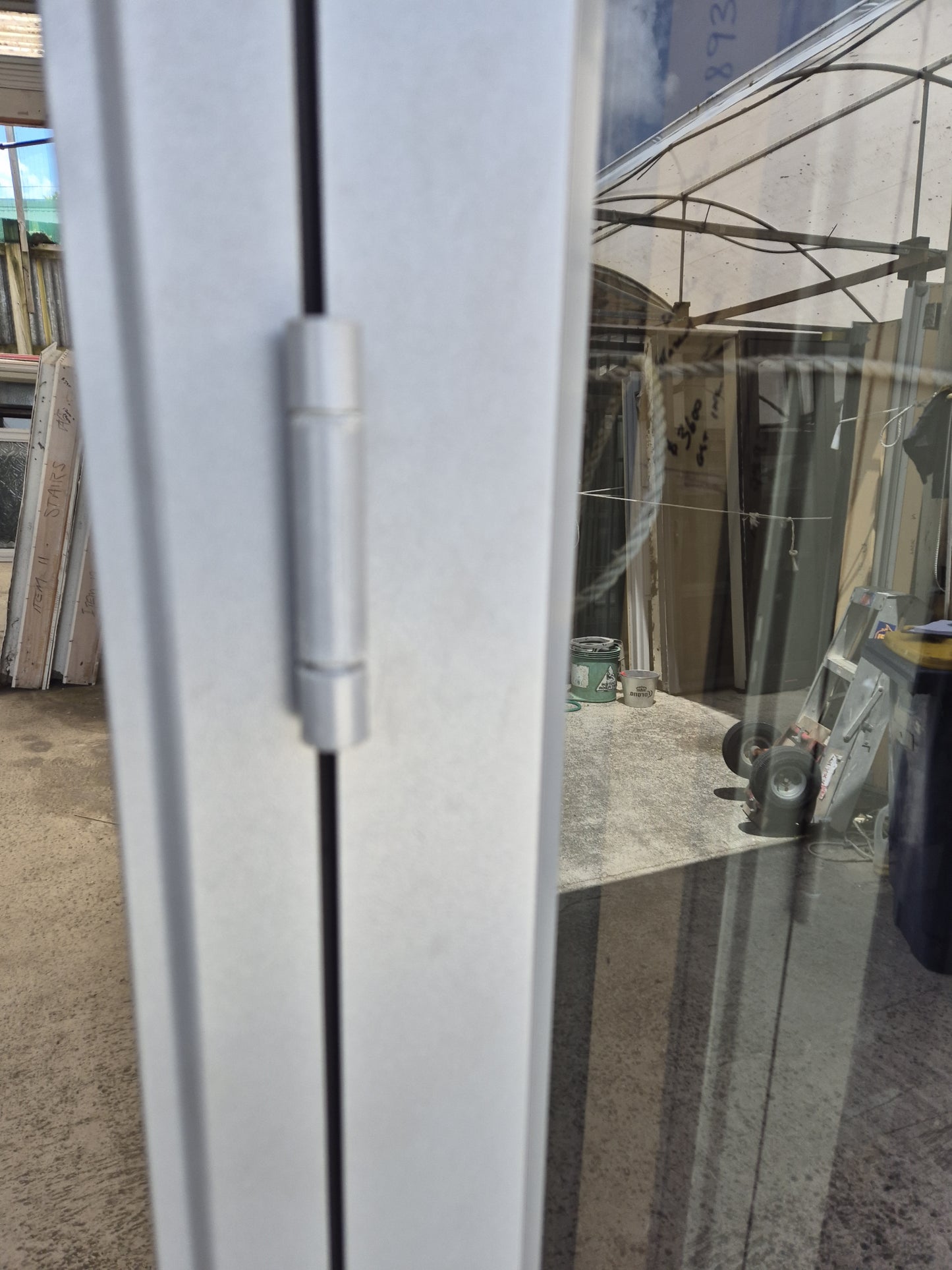 Bifolding door with outside access door 2m H x 2.4W #2077 (2 available)