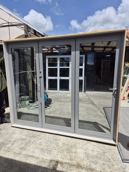 Bifolding door with outside access door 2m H x 2.4 W #2078