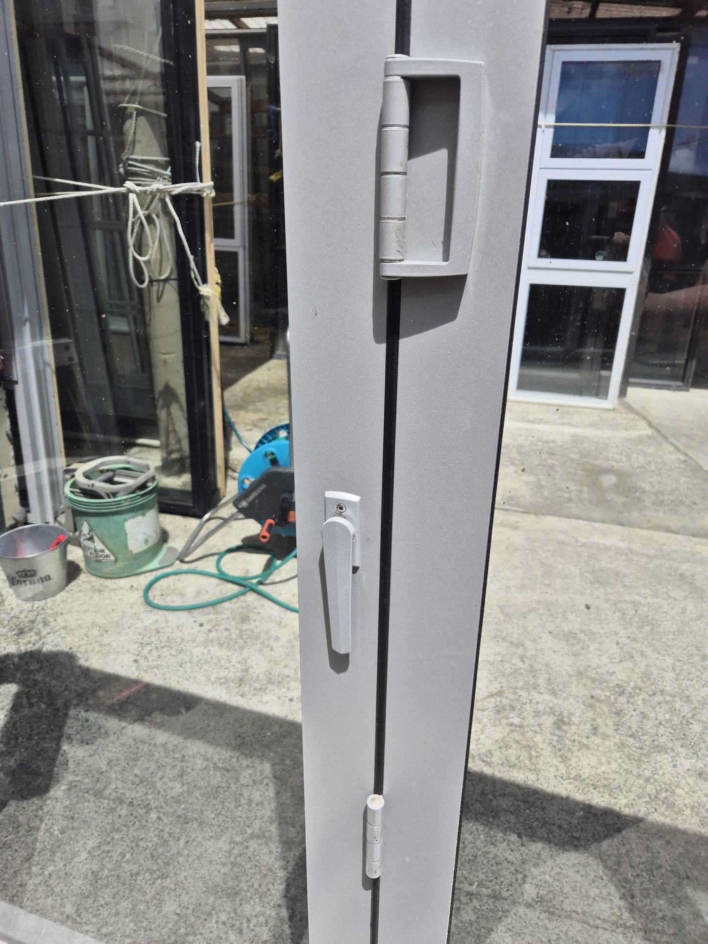 Bifolding door with outside access door 2m H x 2.4 W #2078