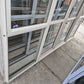 Cream Bi-parting Sliding Door with opening windows 2 H x 2.56W #2338