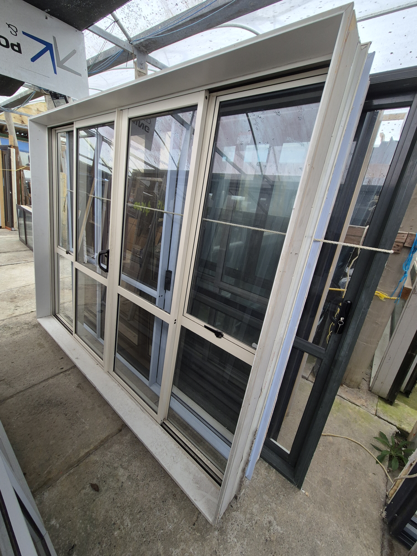 Cream Bi-parting Sliding Door with opening windows 2 H x 2.56W #2338