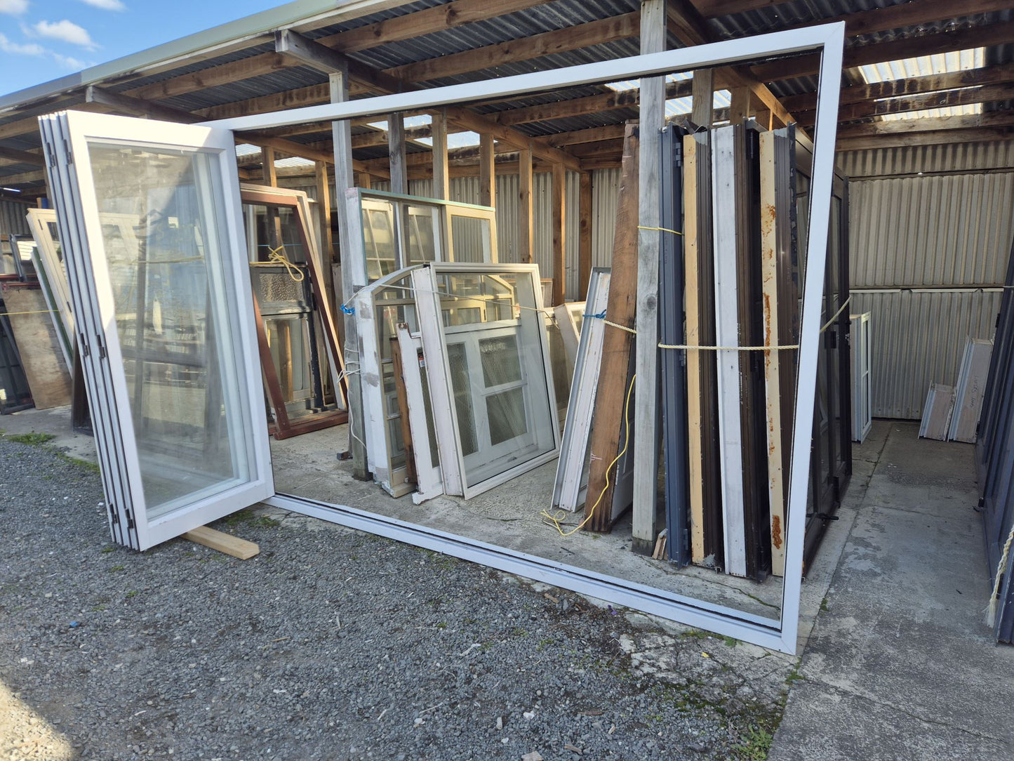 White Bifolding door 2110 H x 3200 W Good Cond. #2359