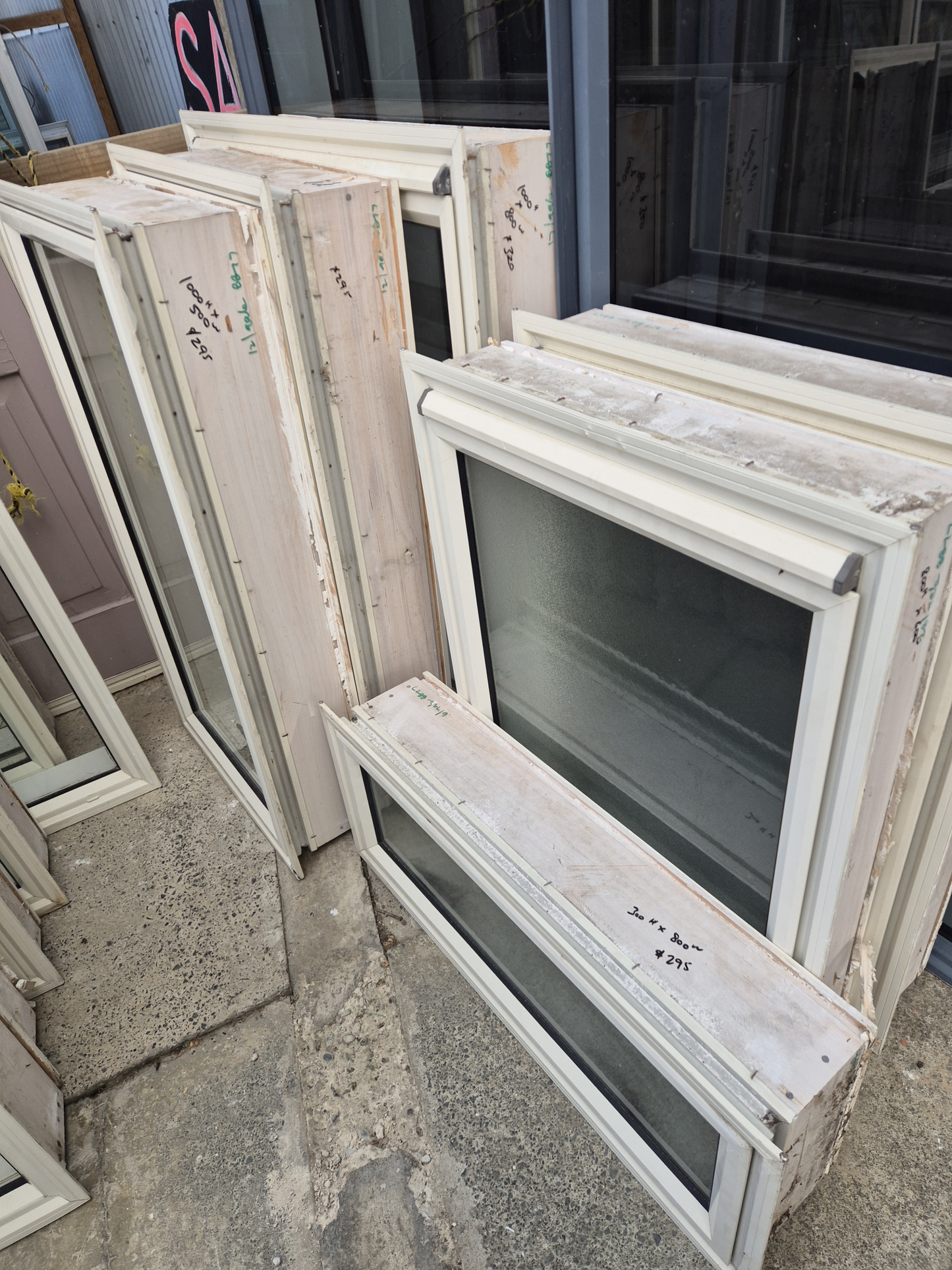 Lot of Cream Joinery, priced individually. Ranchsliders, Leadlite door, Windows