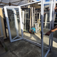 White Bifold door with external access door 2045 x 2460W #2075
