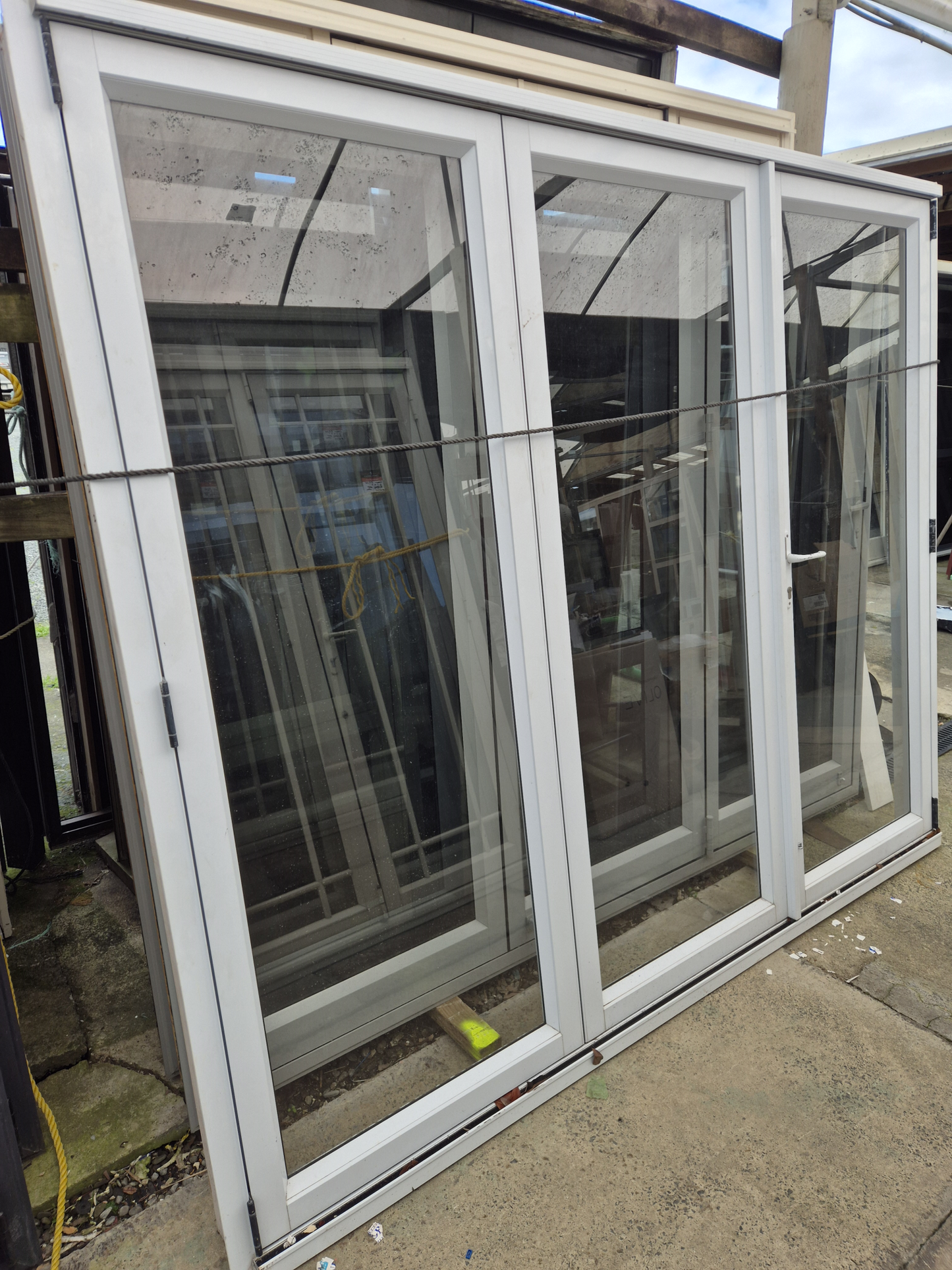 White Bifold door with external access door 2045 x 2460W #2075