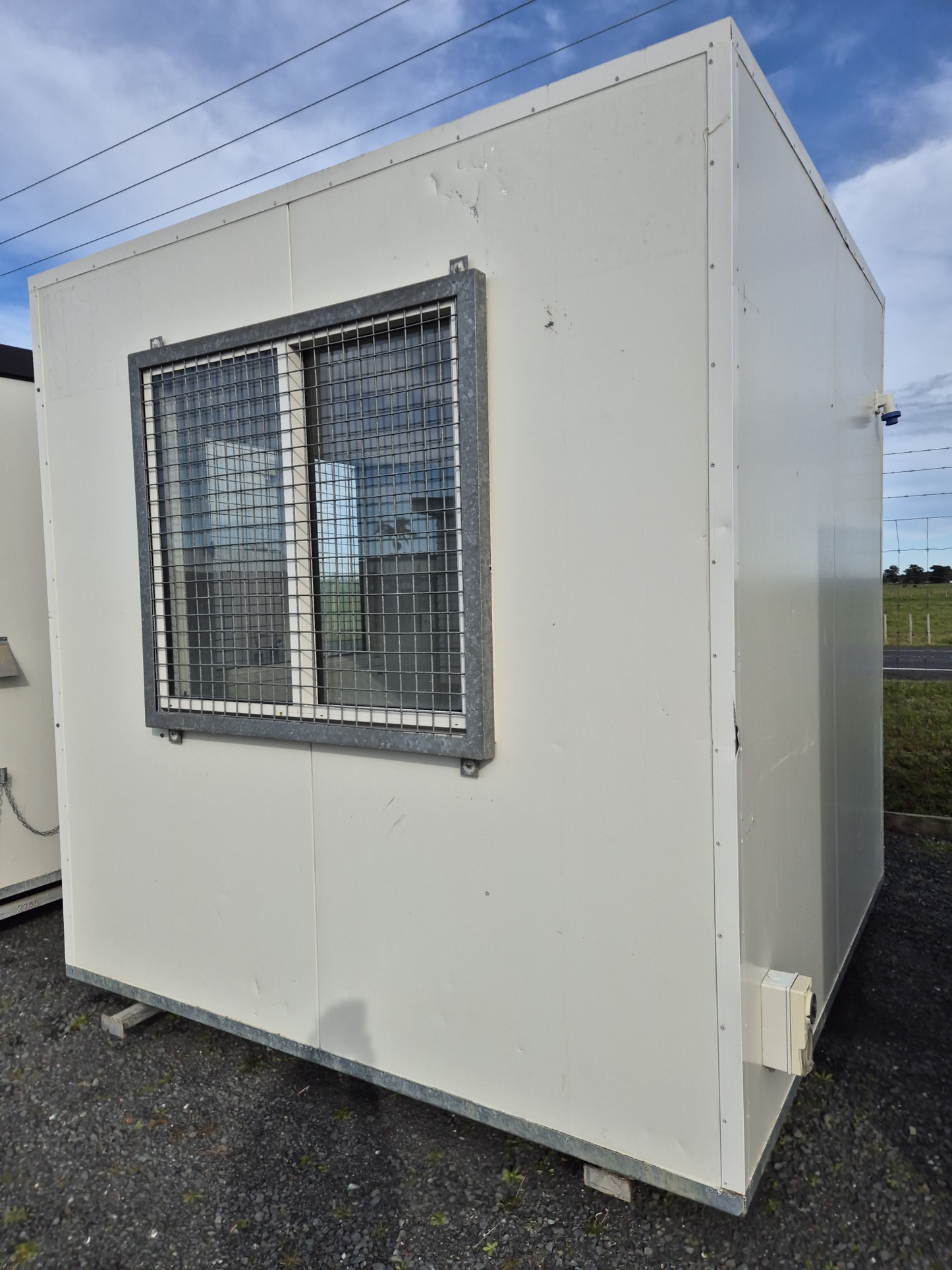 Small Portacom 2.4mSq Double glazed sliding windows. Matchin6x3m also available