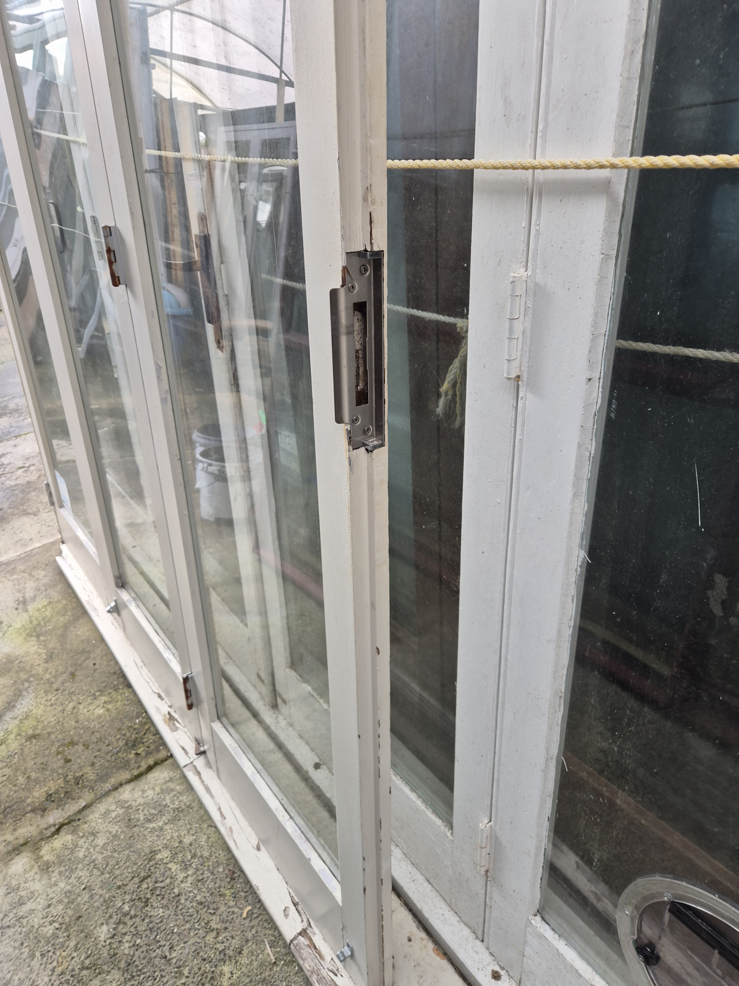 Wooden Bifolding Door with outside entry door 2220 H x 2540 W #2091