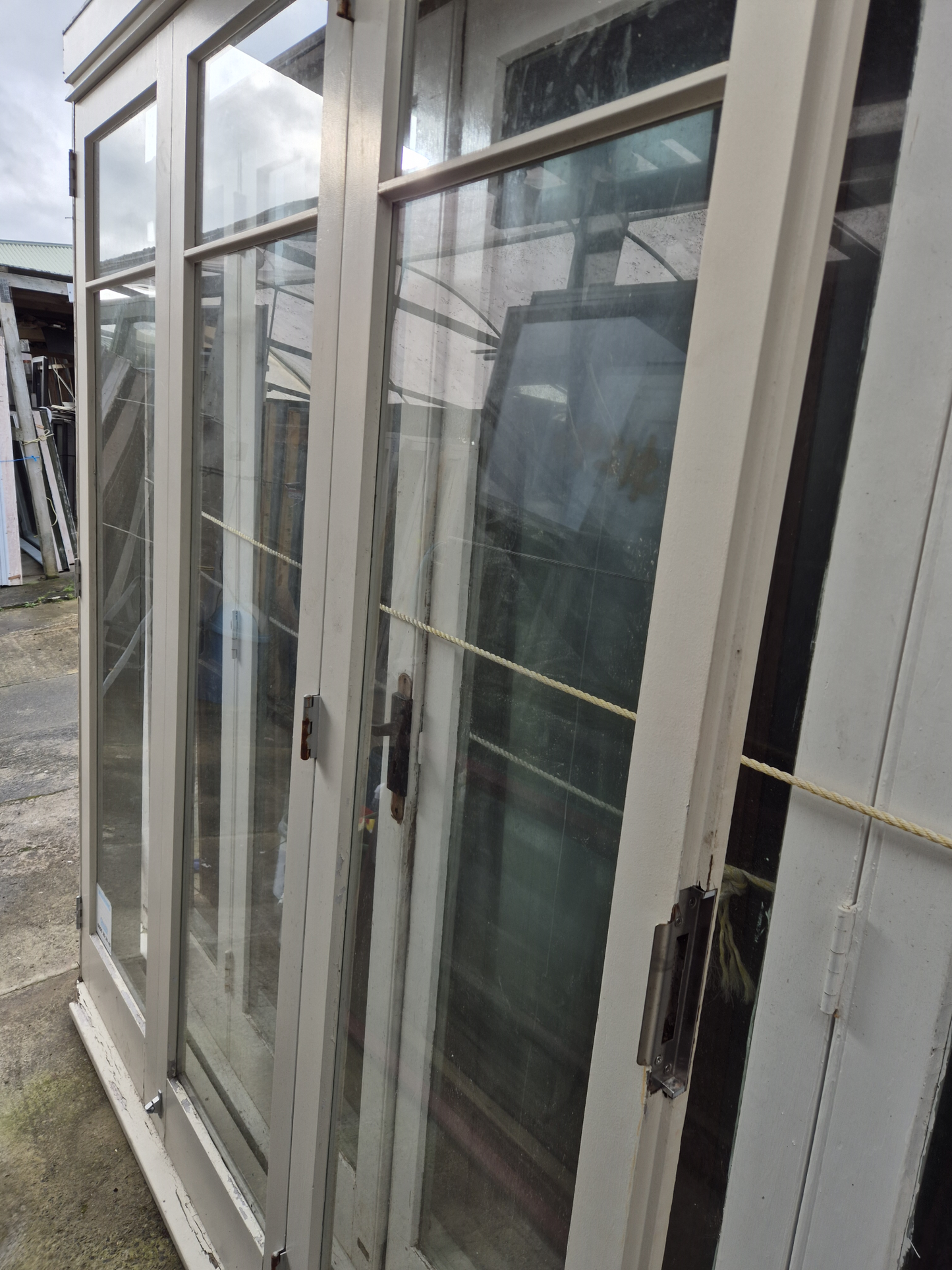 Wooden Bifolding Door with outside entry door 2220 H x 2540 W #2091