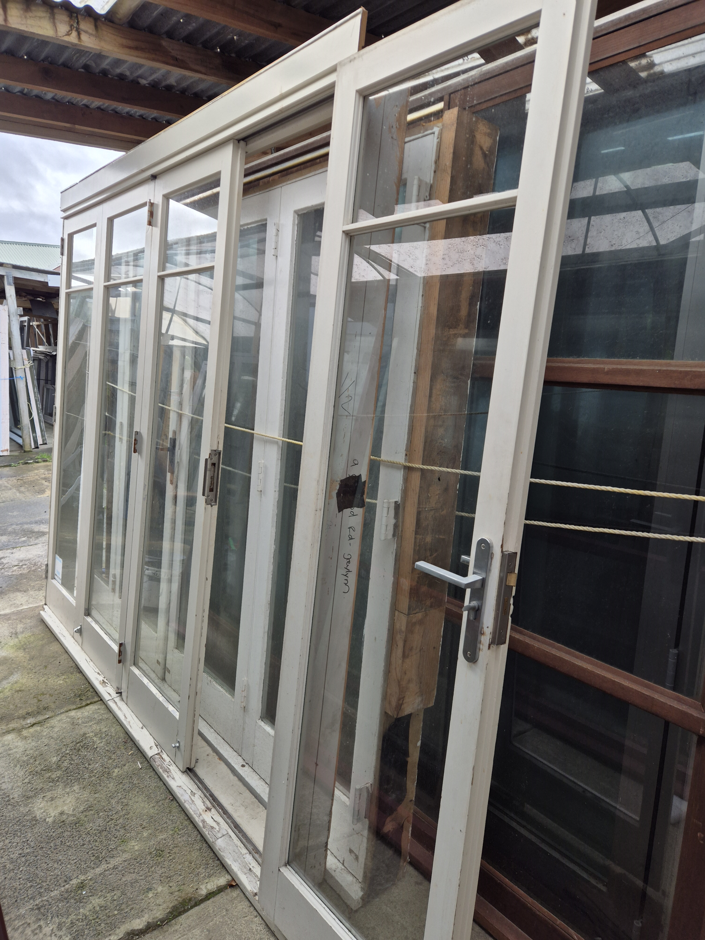 Wooden Bifolding Door with outside entry door 2220 H x 2540 W #2091