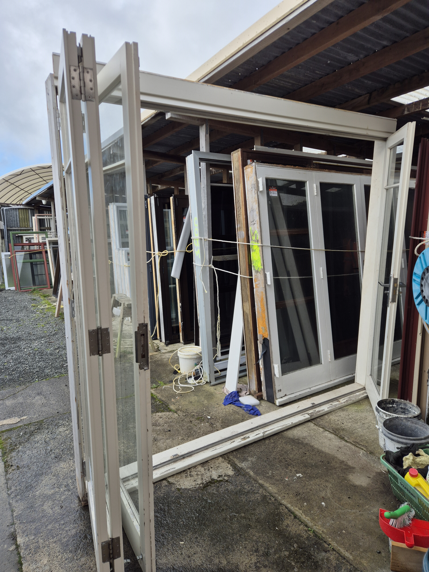 Wooden Bifolding Door with outside entry door 2220 H x 2540 W #2091