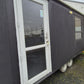 PORTABLE CABIN ON A DOUBLE AXEL TRAILER