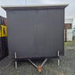 PORTABLE CABIN ON A DOUBLE AXEL TRAILER