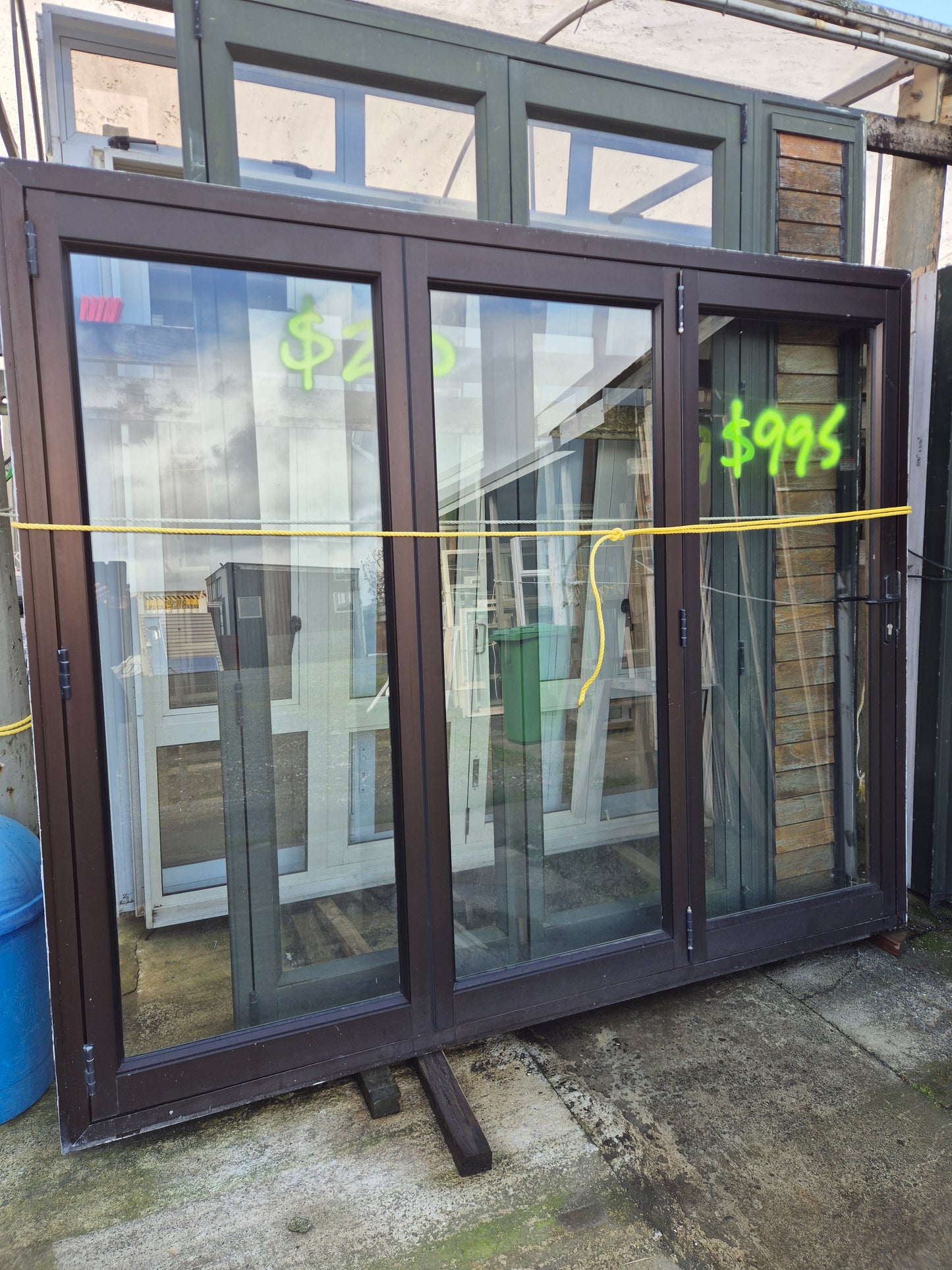 Bronze Bifolding Door with access/entry door 2 H x 2.4 W #2442