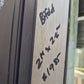 Bronze Bifolding Door with access/entry door 2 H x 2.4 W #2442