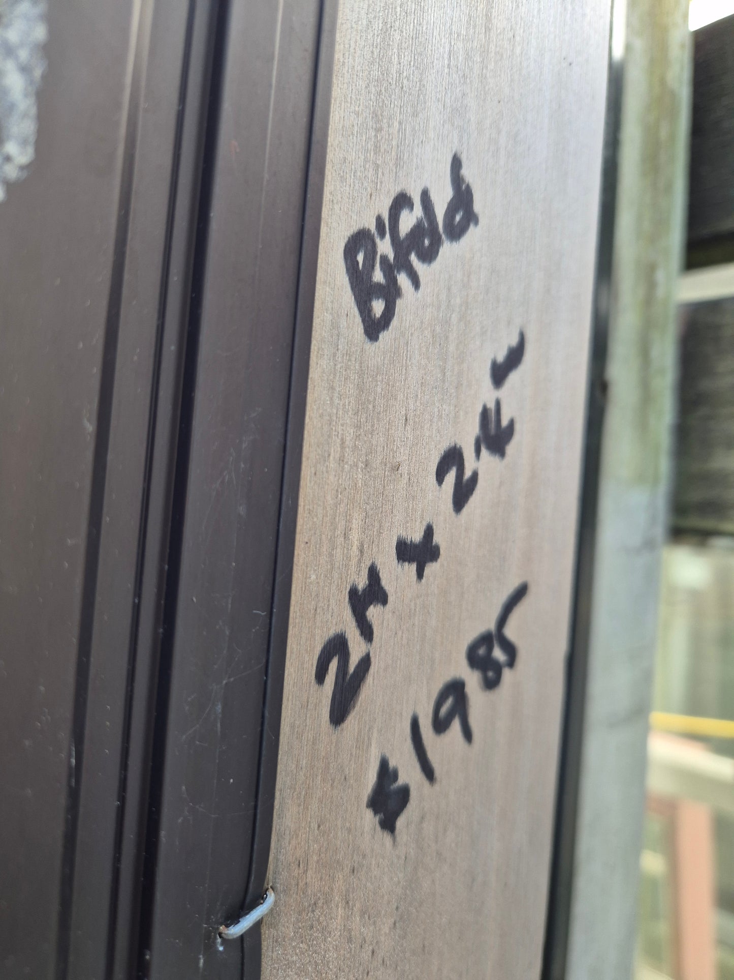 Bronze Bifolding Door with access/entry door 2 H x 2.4 W #2442